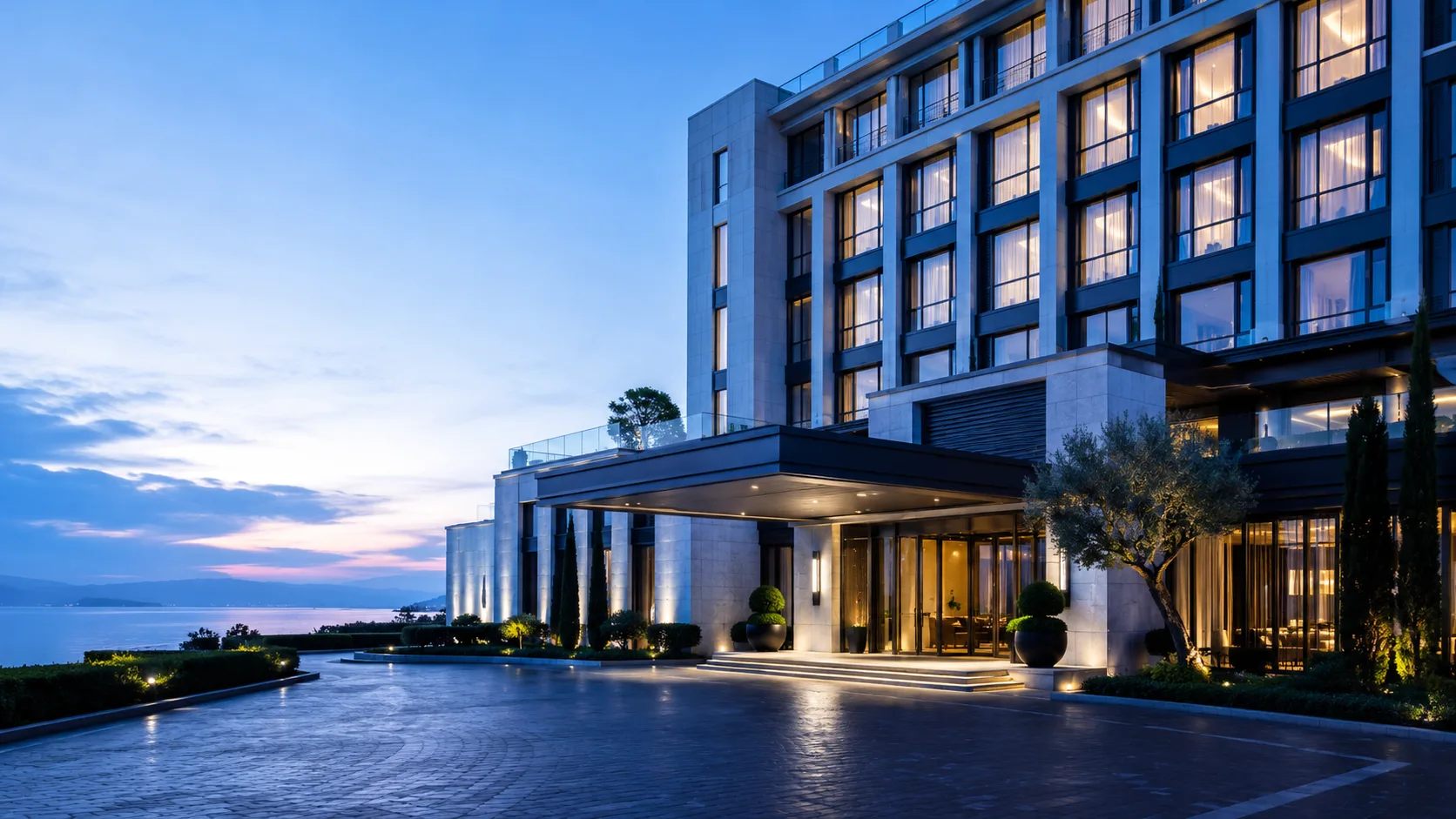 Luxury waterfront hotel at dusk